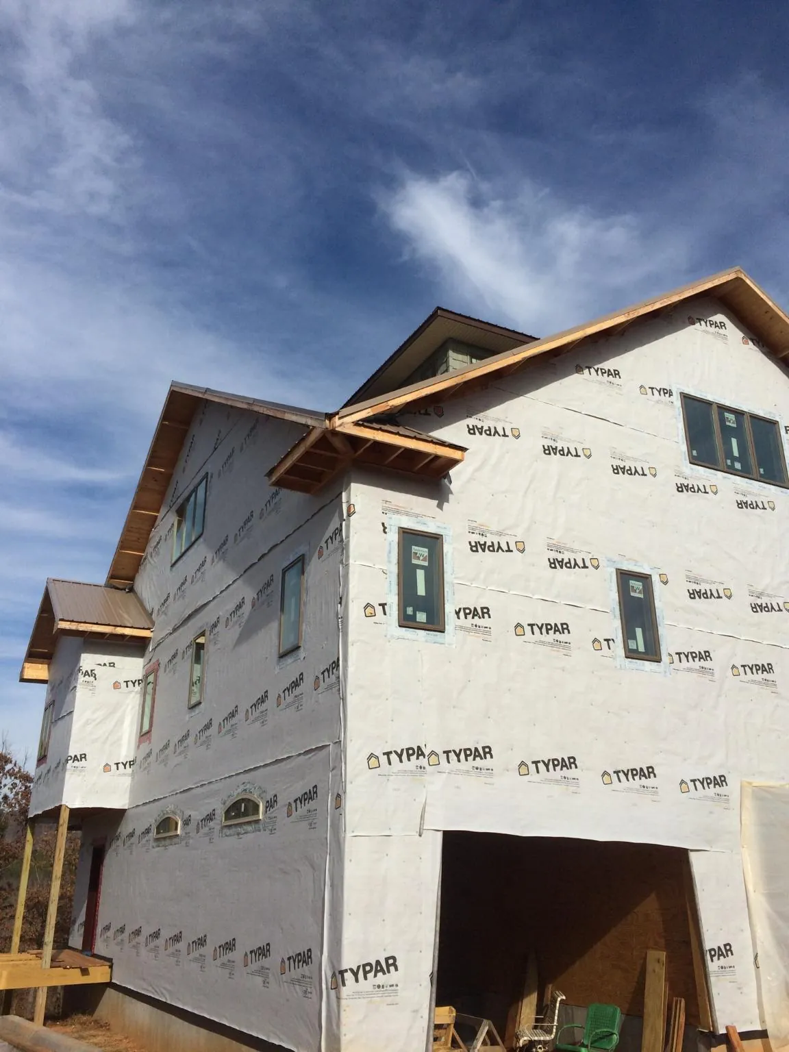 Stick built house wrapped in Typar with new roof framing and dormers in Minersville